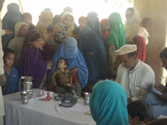 WWOA medical camp treating families in Kama district, Nangarhar